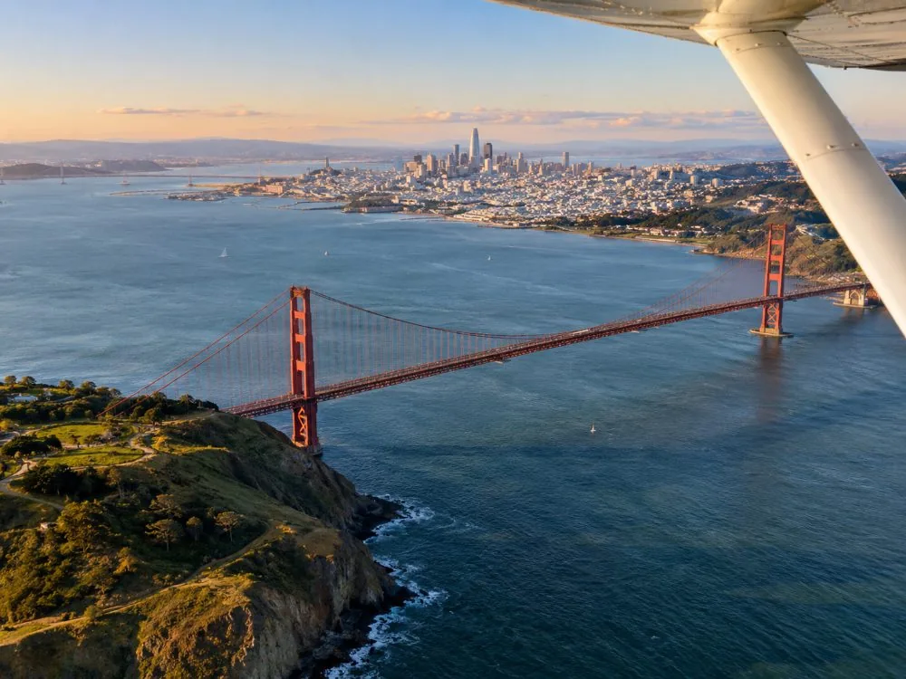 The Golden Gate Bridge from the air, with San Francisco behind it